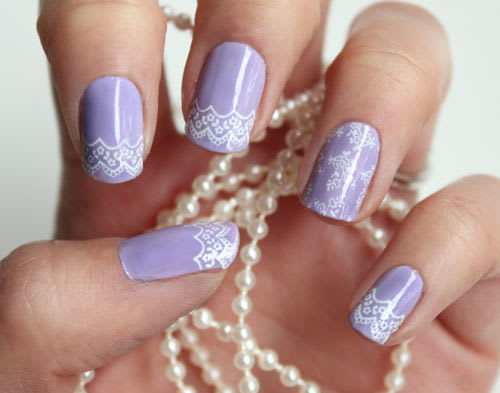 We're going to take the lace trend and put that on our nails today-- an