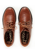 The Dollhouse Trickster Chestnut Brogue Lace-Up Oxfords are the quickest trick to a flawless \\\'fit! Tan vegan leather oxfords with brogue details and coated shoestrings.