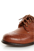 The Dollhouse Trickster Chestnut Brogue Lace-Up Oxfords are the quickest trick to a flawless \\\'fit! Tan vegan leather oxfords with brogue details and coated shoestrings.