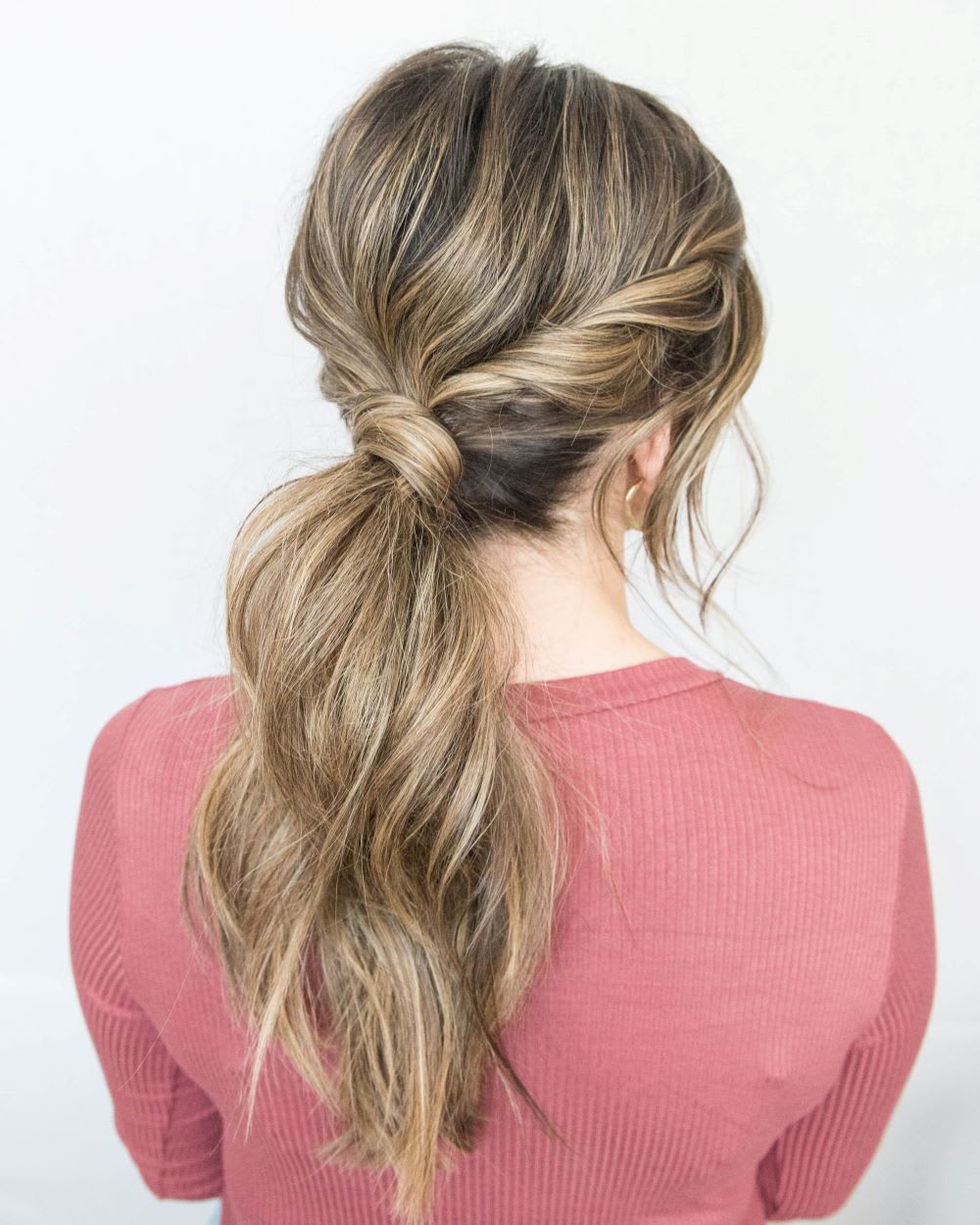 Image of Low ponytail with a twist