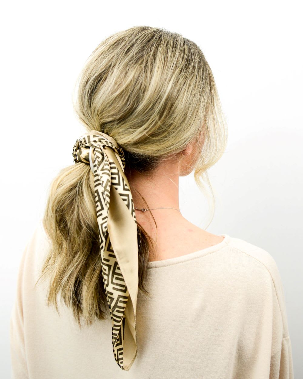 Scarf Hairstyles Winter Look: Cozy, Stylish & Hair Friendly Ideas 8 https://www.lulus.com/blog/wp-content/uploads/2011/10/Lulus-Nov-2020-3.jpg?utm_source=chatgpt.com