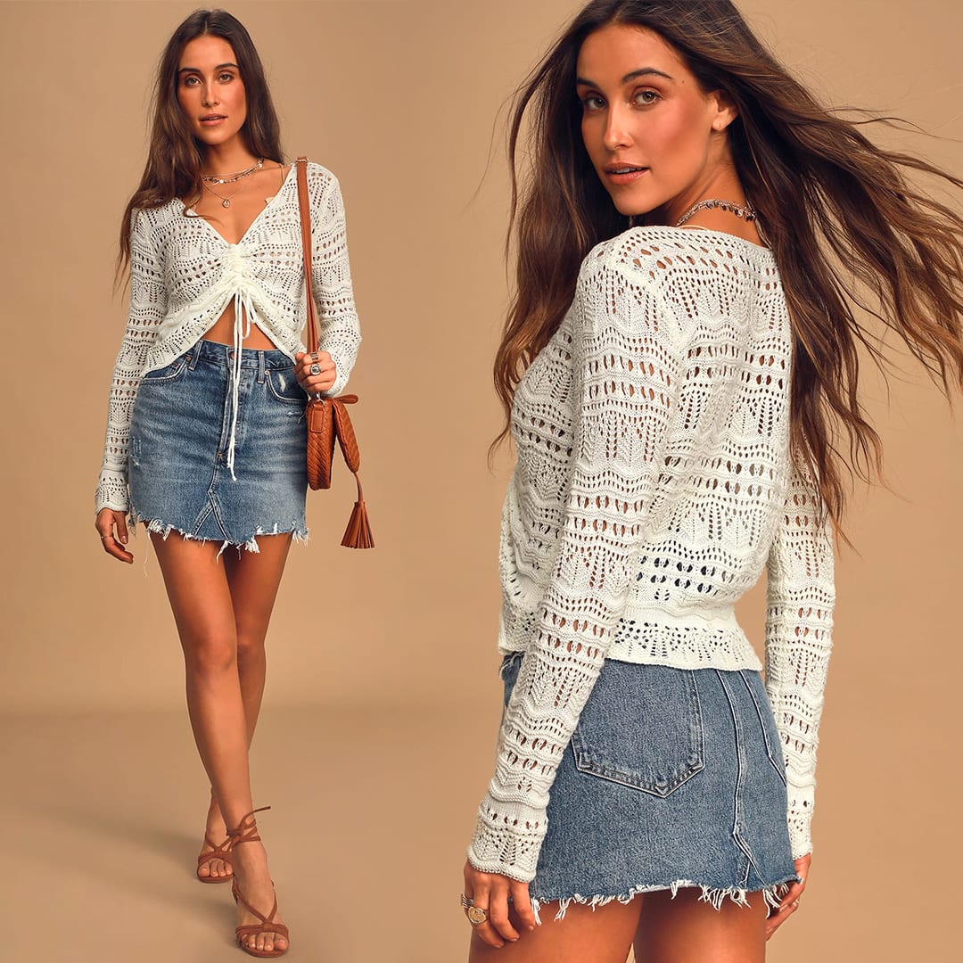 two angles of a model in an ivory sheer crochet ruched sweater top