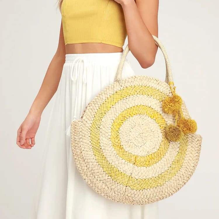 beige and yellow round woven tote
