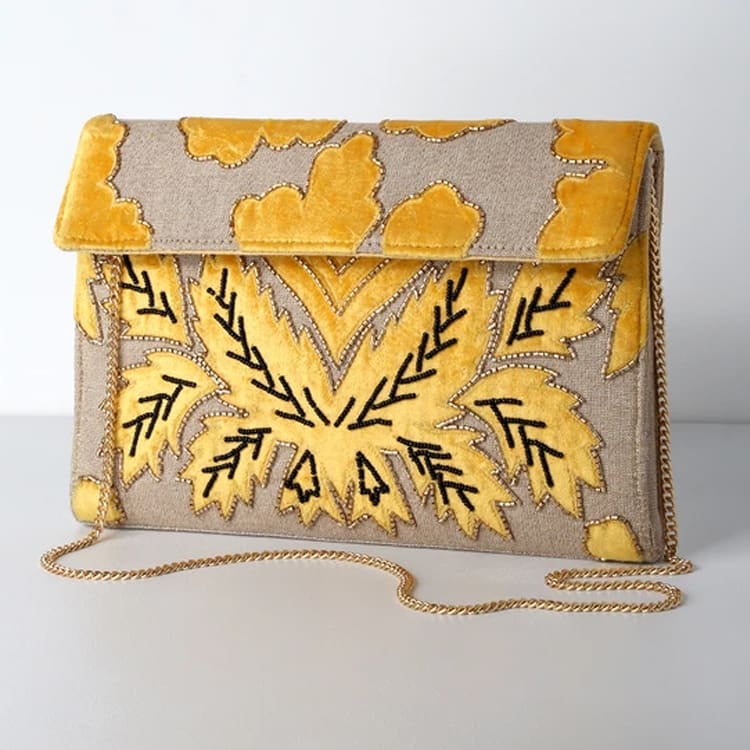 Yellow embroidered clutch: embroidery clothing - embroidery trend - floral embroidered clothing