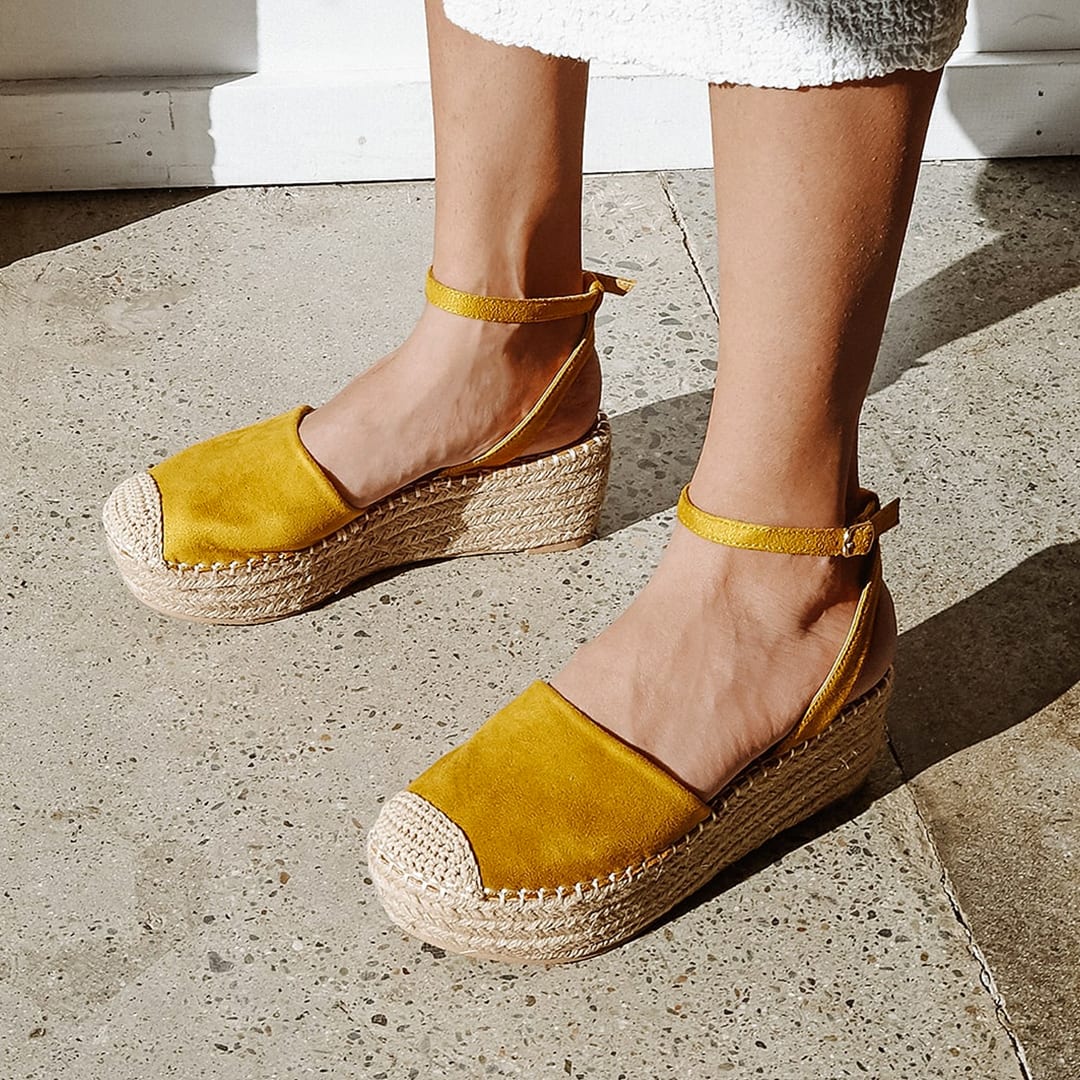 feet in marigold suede flatform espadrilles