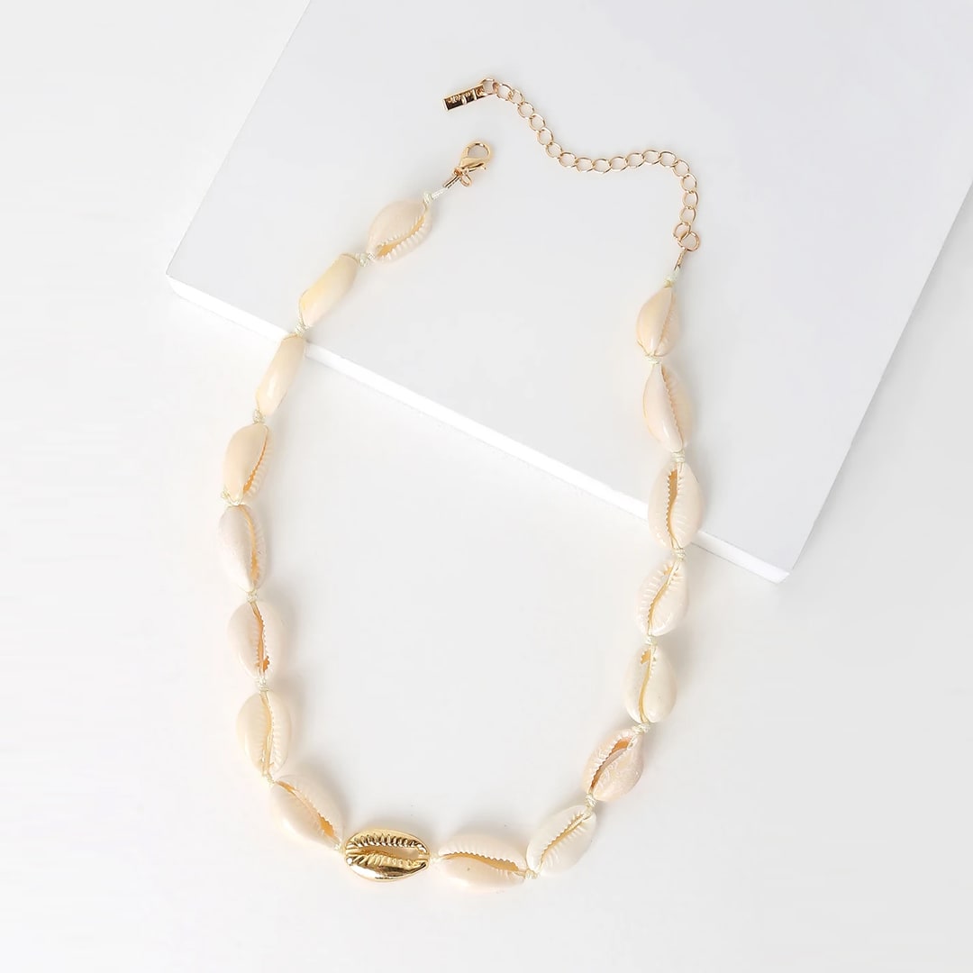 white and gold cowrie shell necklace choker