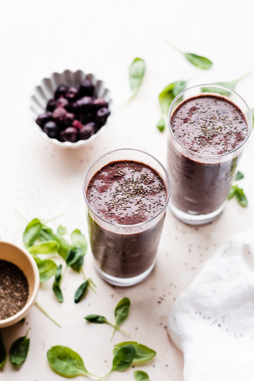 two glasses of berry smoothie with yogurt 