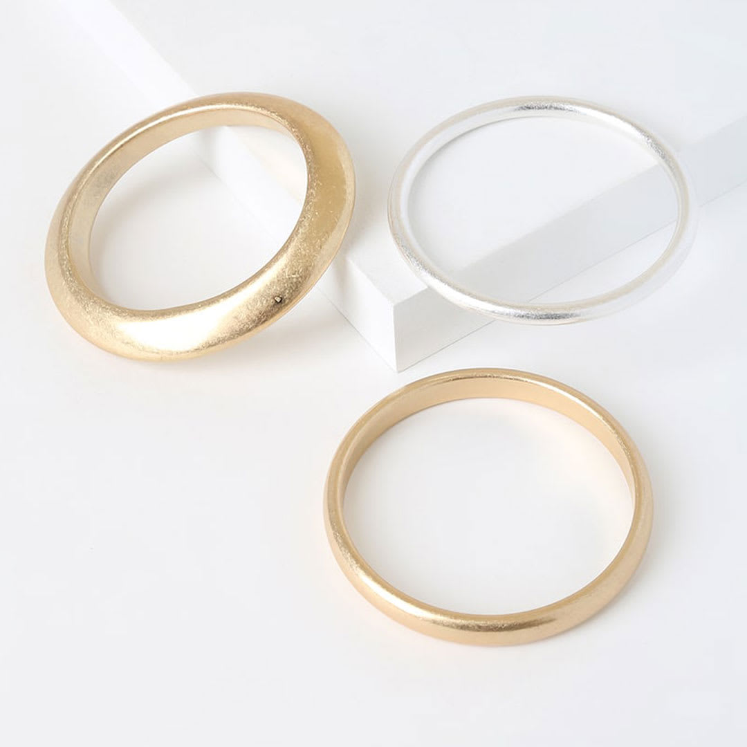 minimalist fashion: gold and silver bangles