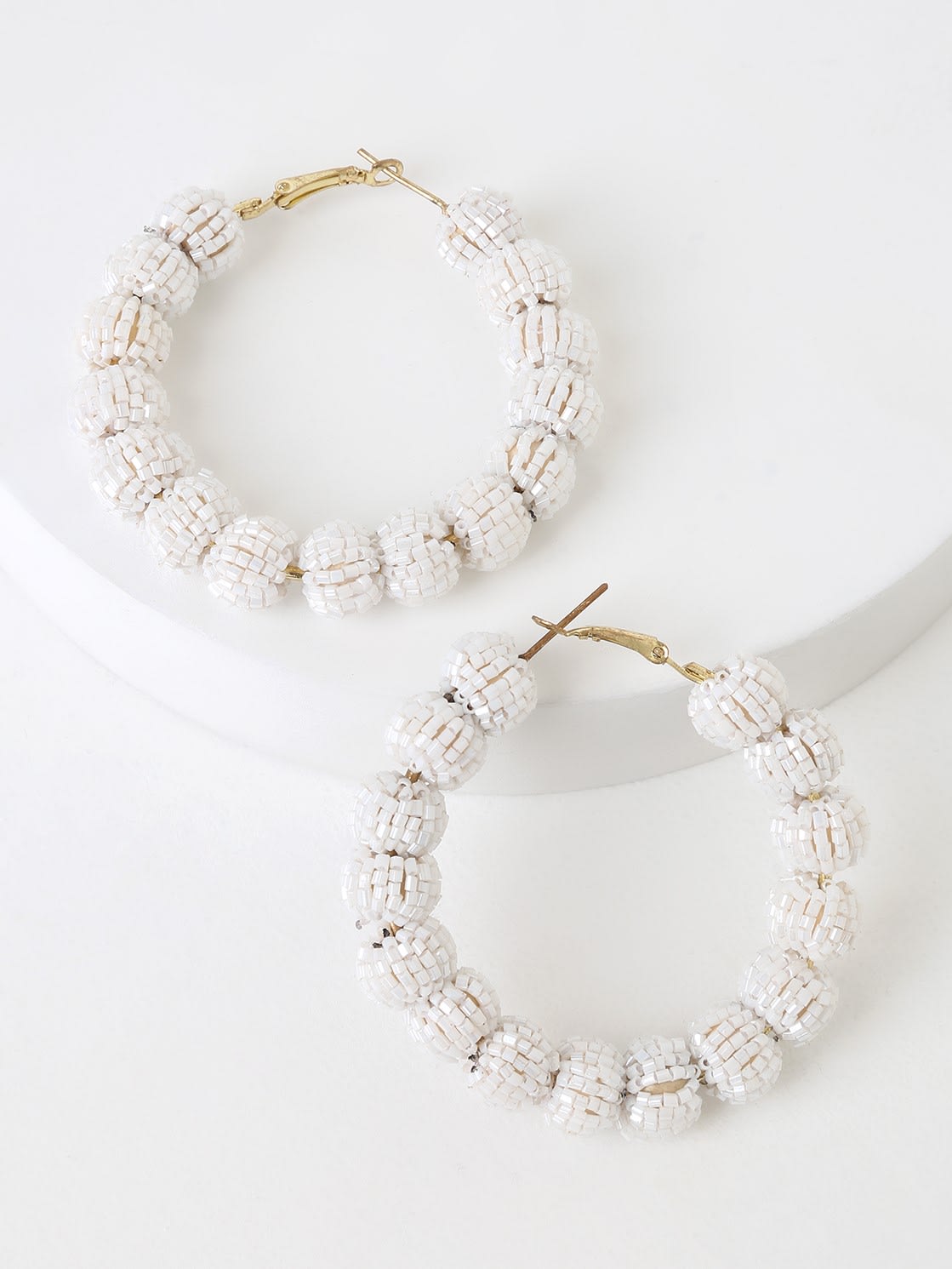 white beaded hoop earrings