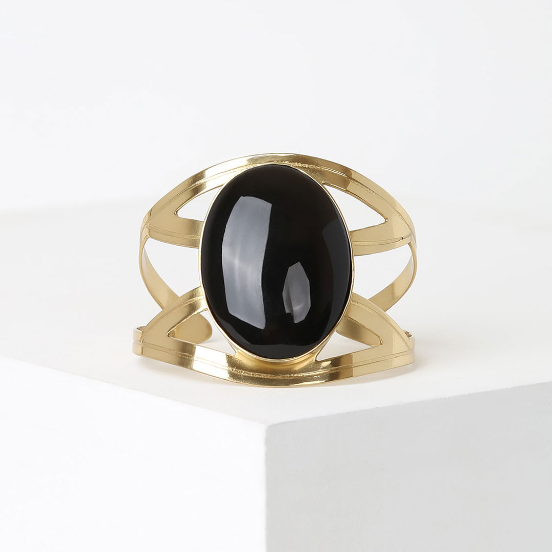 gold cuff bracelet with black stone