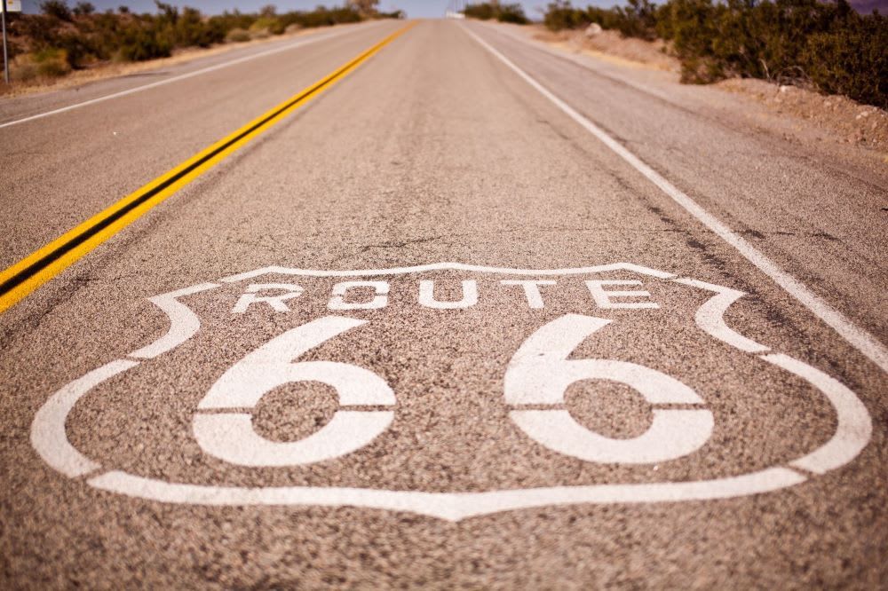 Route 66 street sign for best road trips