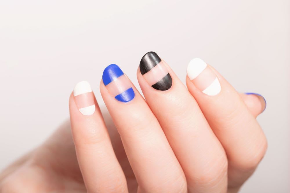 blue, white, and black negative space stripe manicure