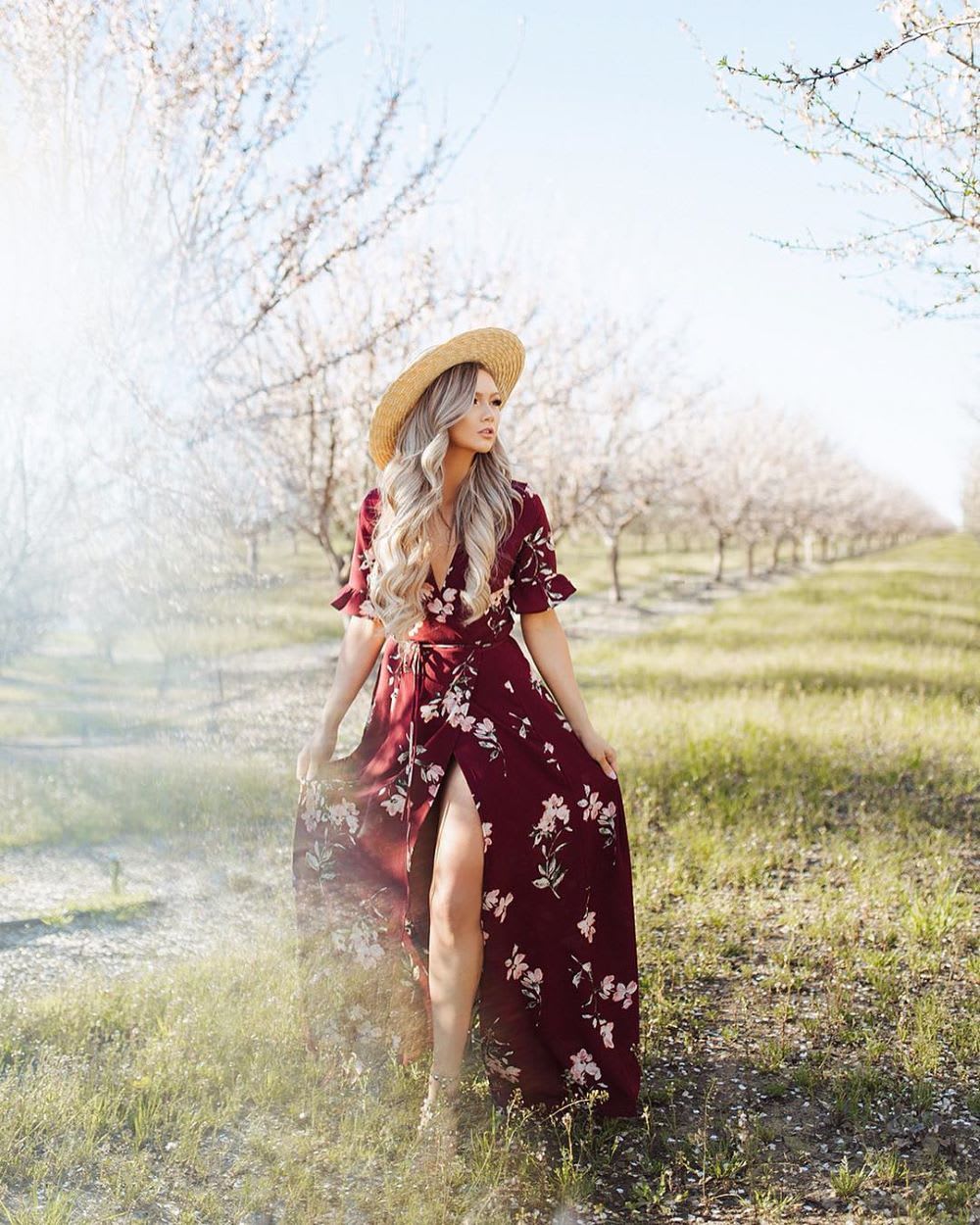 woman wearing burgundy clothes trend- floral dress outfit