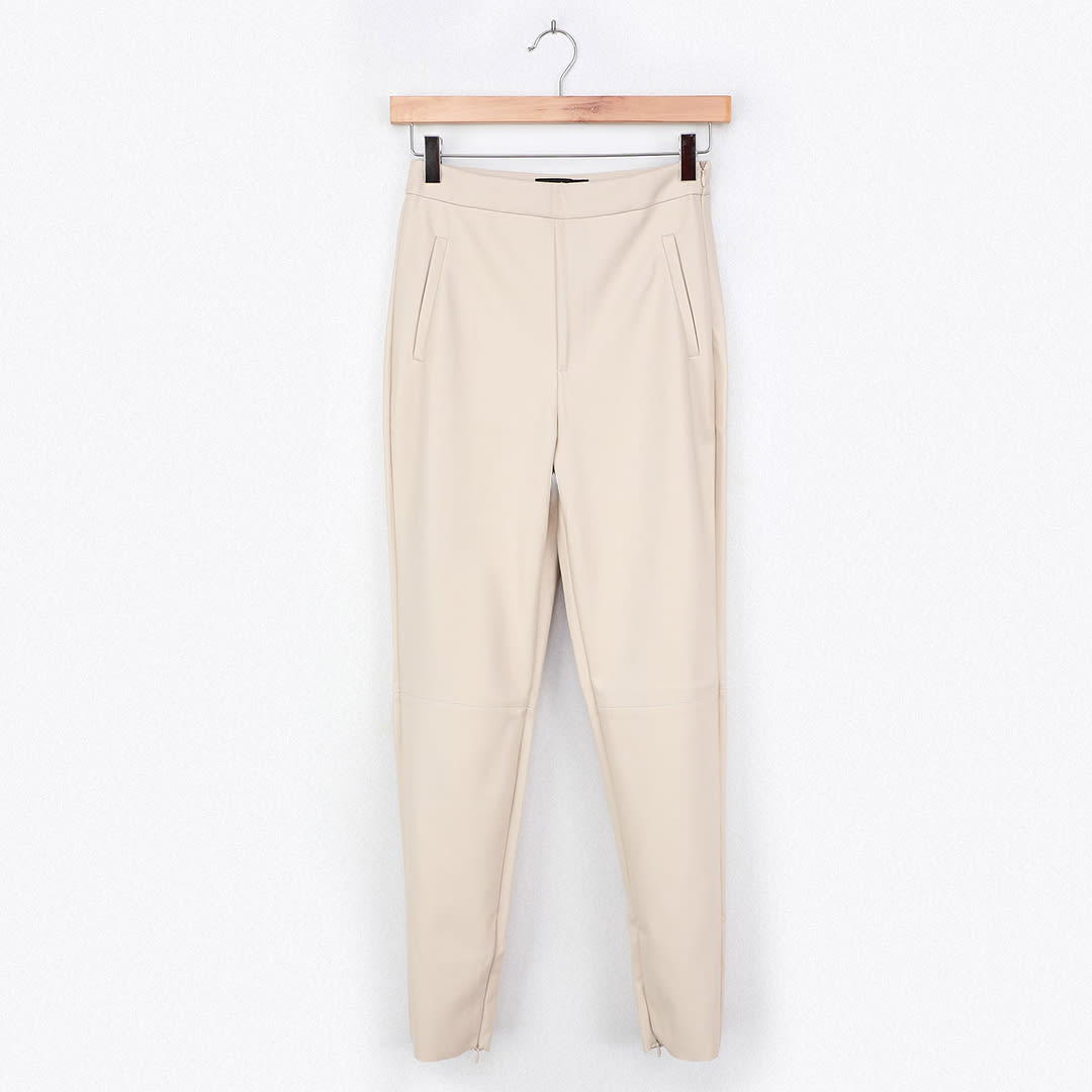 off white vegan leather pants