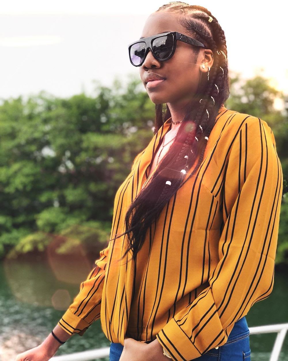 woman in yellow striped top: dont delay investments 