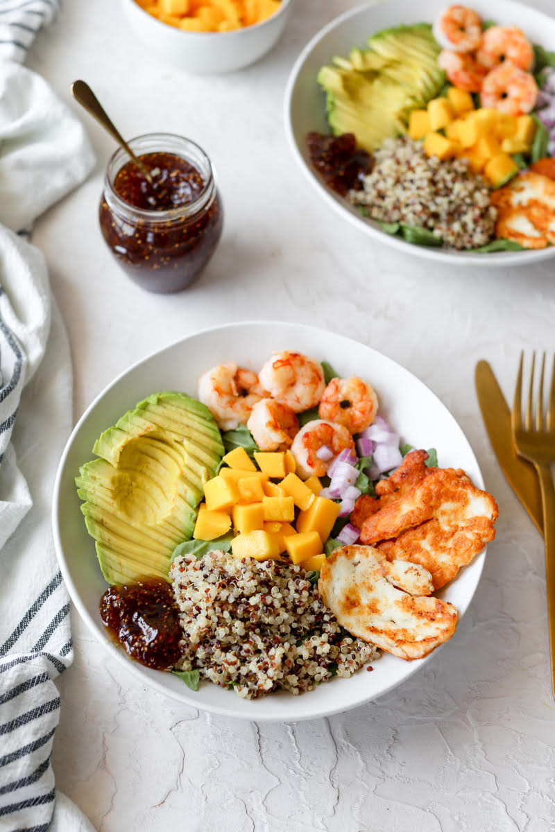 shrimp and mango salad with fried halloumi cheese, avocado, quinoa, and fig jam