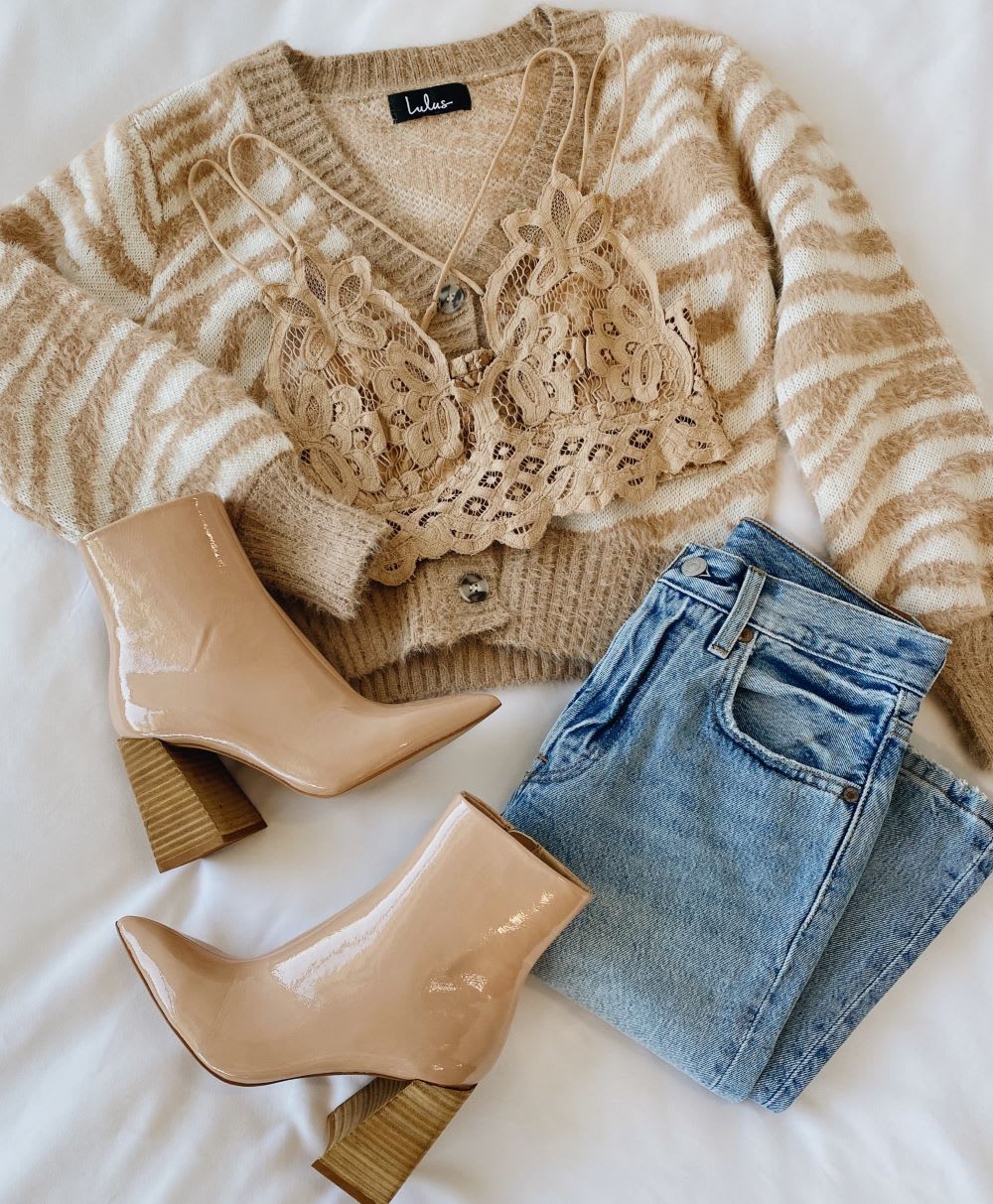 animal print sweater cardigan with jeans and boots and lace bralette