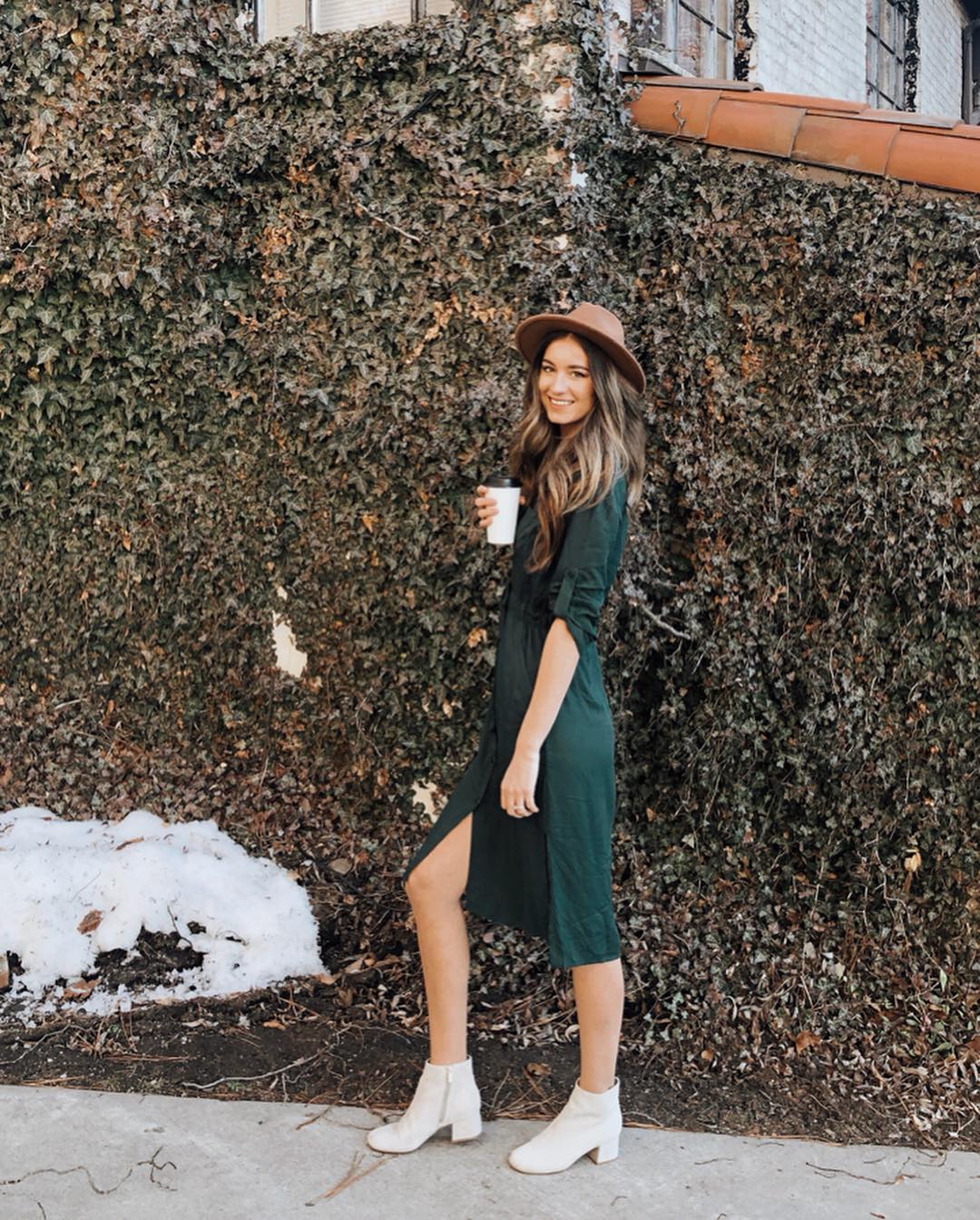 swap bone broth coffee? woman in green dress holds a cup