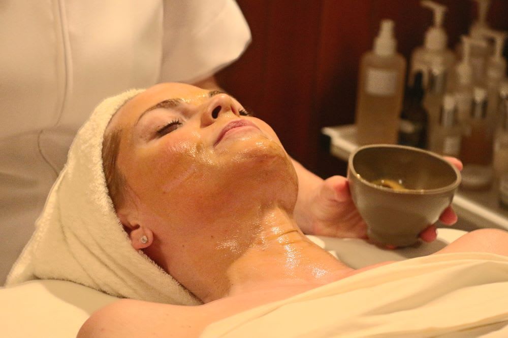 woman getting a pumpkin facial at one spa at shutters