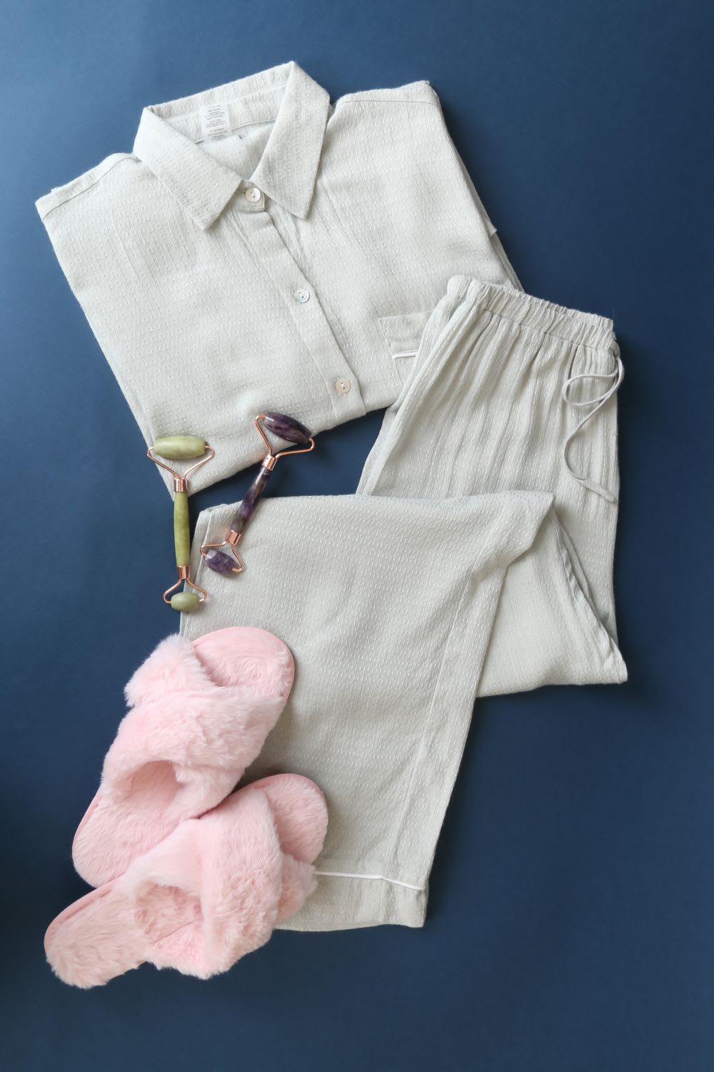 pajamas, furry slippers, and jade facial rollers as holiday gift ideas