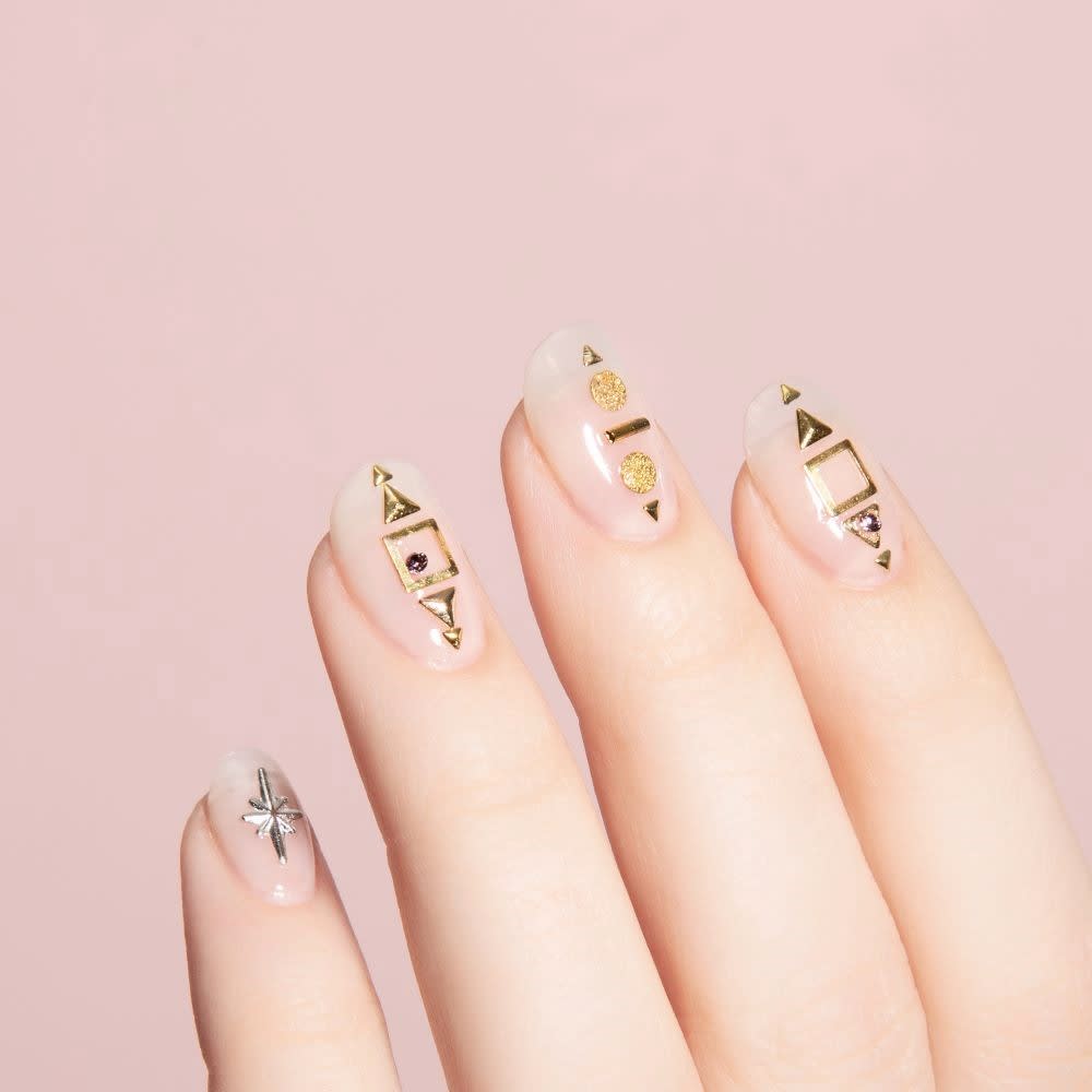 silver and gold nail charms