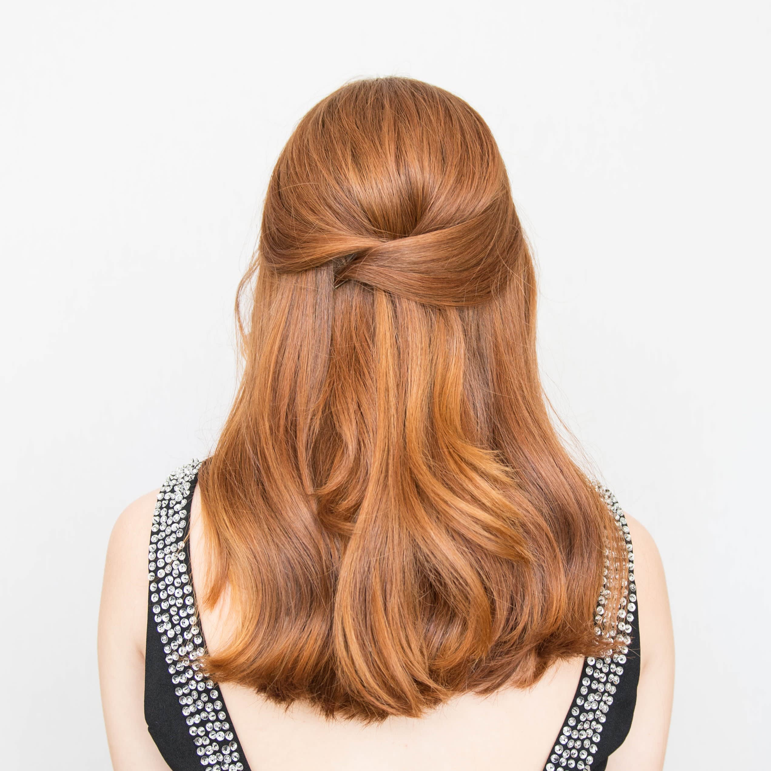 Image of Sleek half-up half-down hairstyle for work