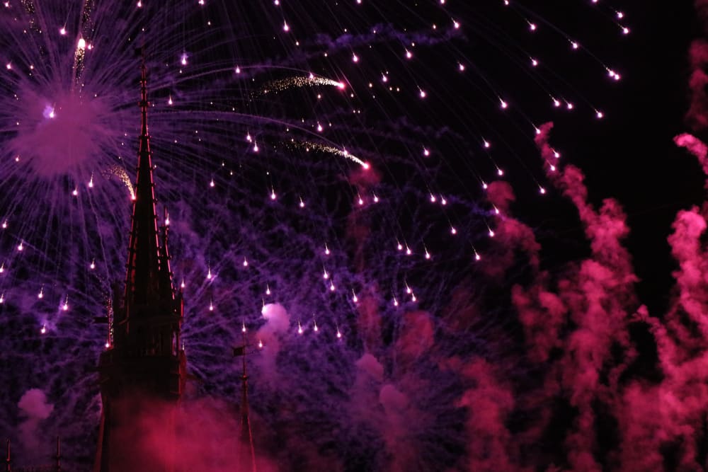 fireworks at disney world castle for engagement photos