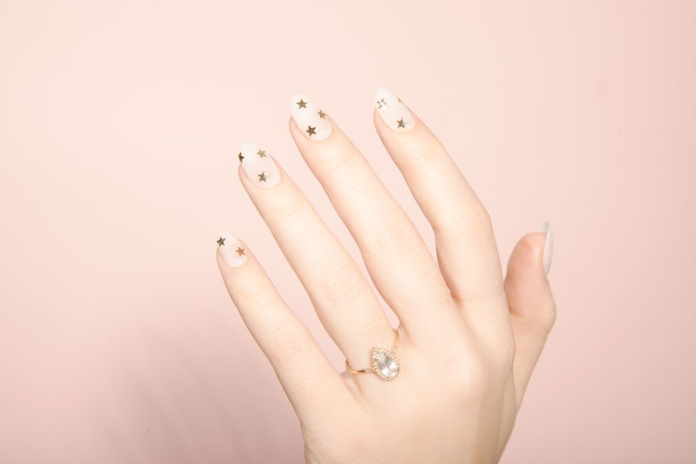 nail design with stars using glitter nail polish