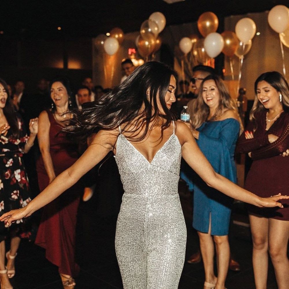 woman in sequin bridal jumpsuit