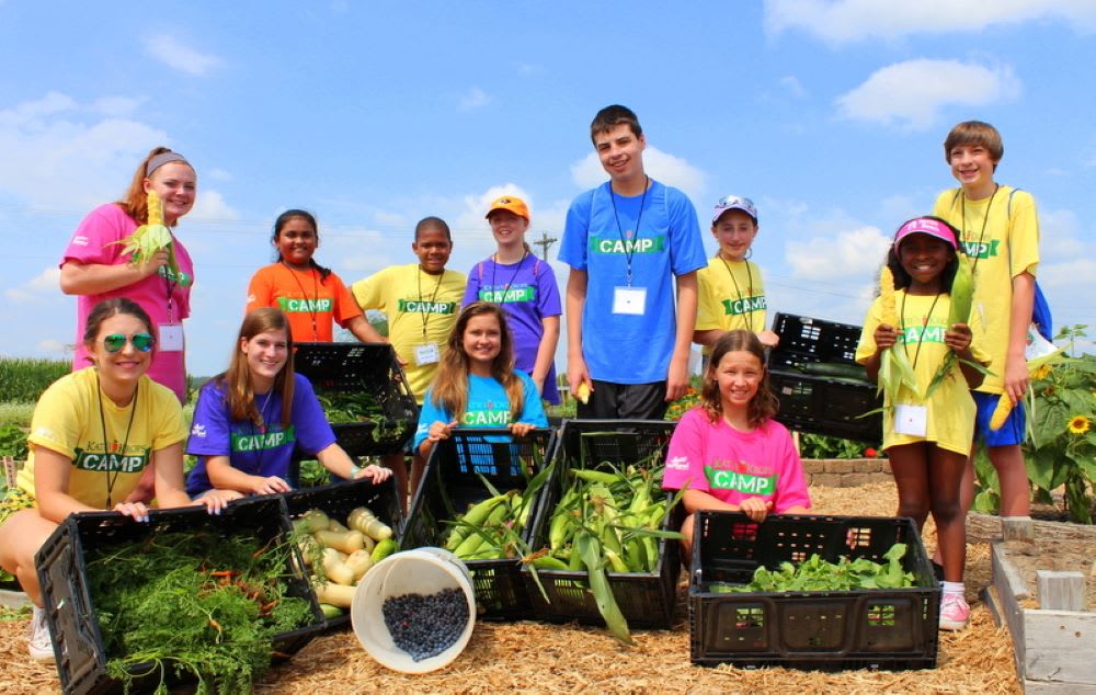 kids growing vegetables to prevent food insecurity