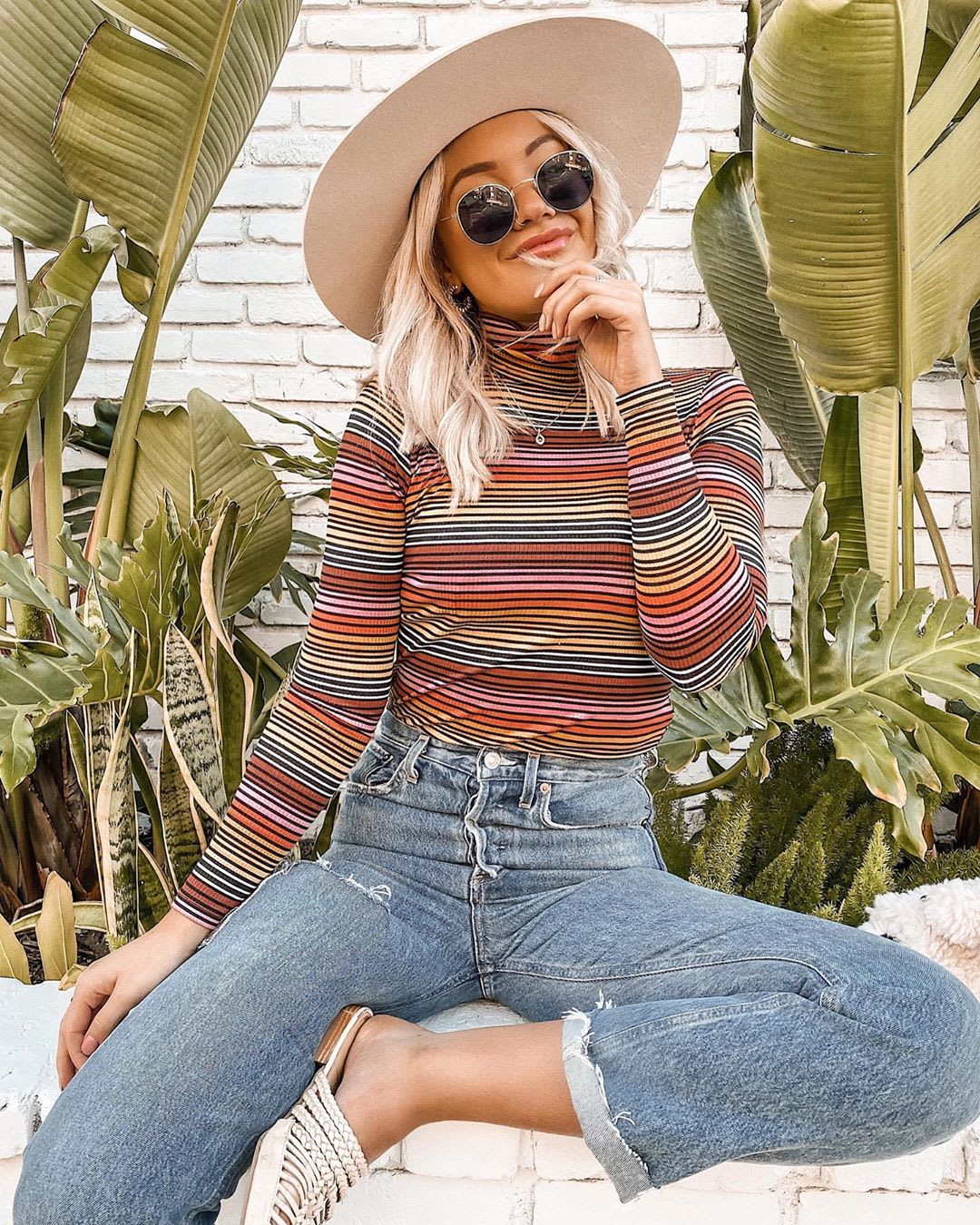 woman in striped top and hat
