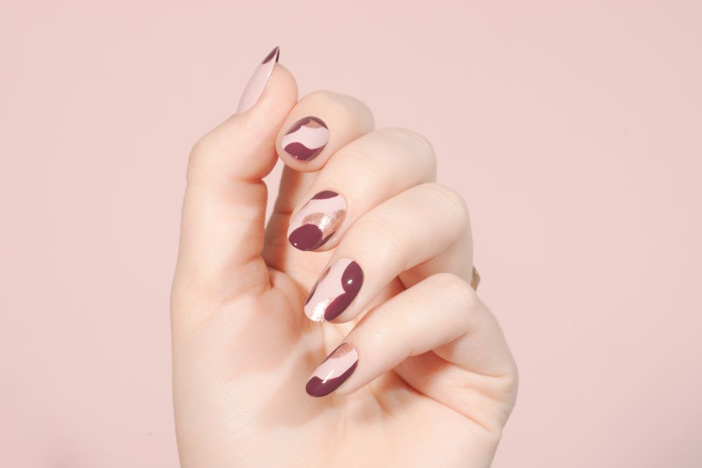 7. Burgundy and Rose Gold Gel Nails - wide 6