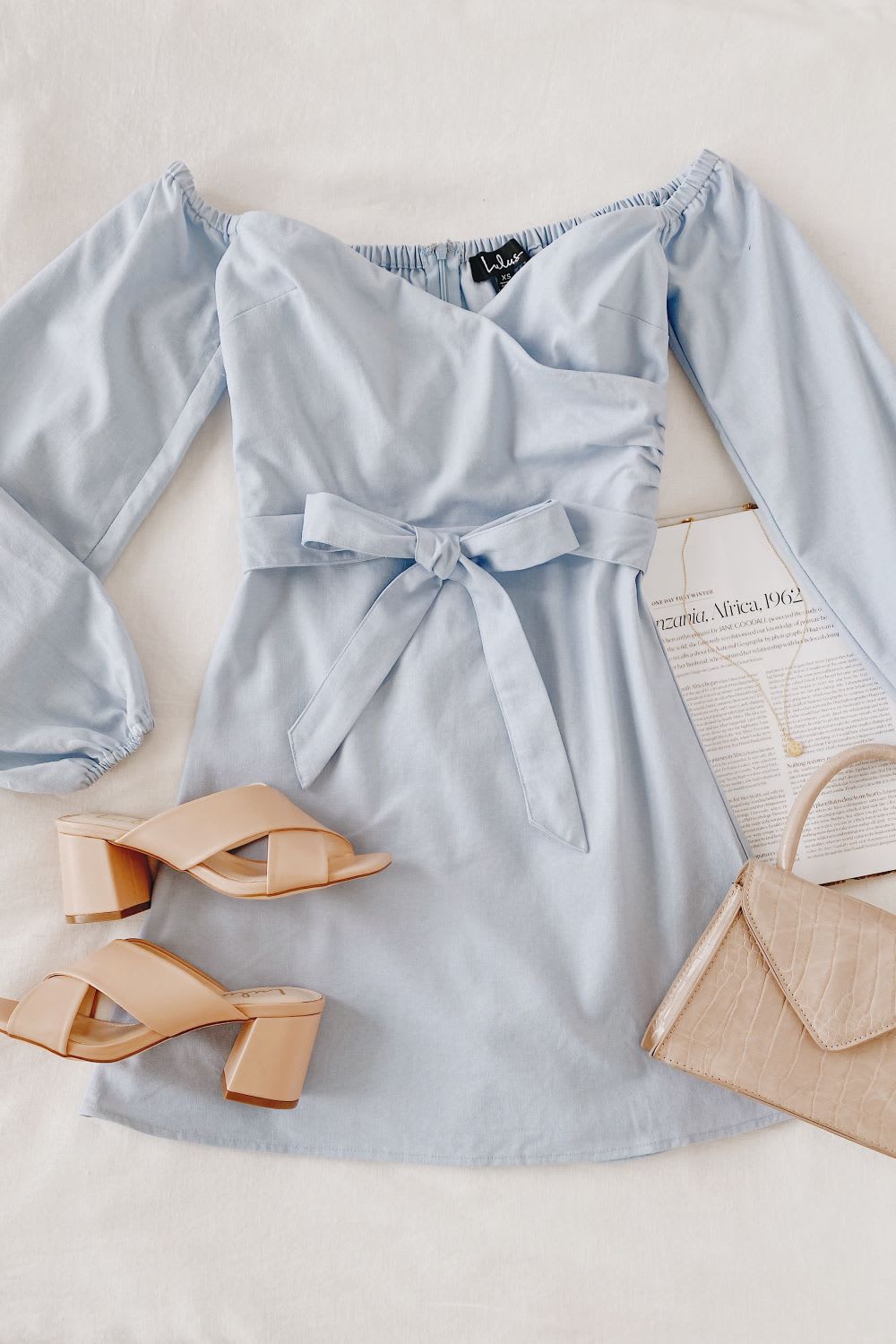 light blue off the shoulder puff sleeve faux wrap dress