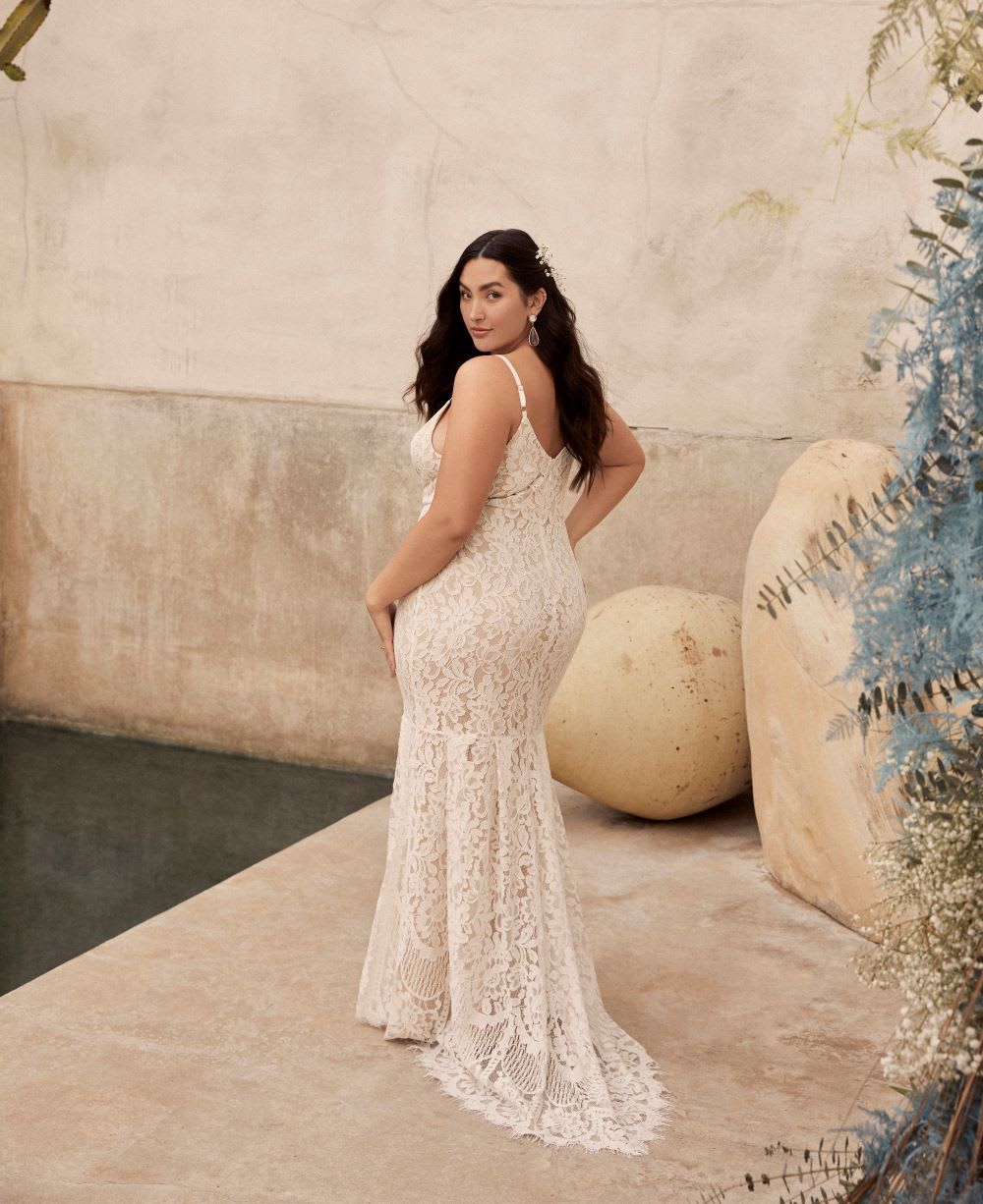 bride in lace plus-size wedding dress