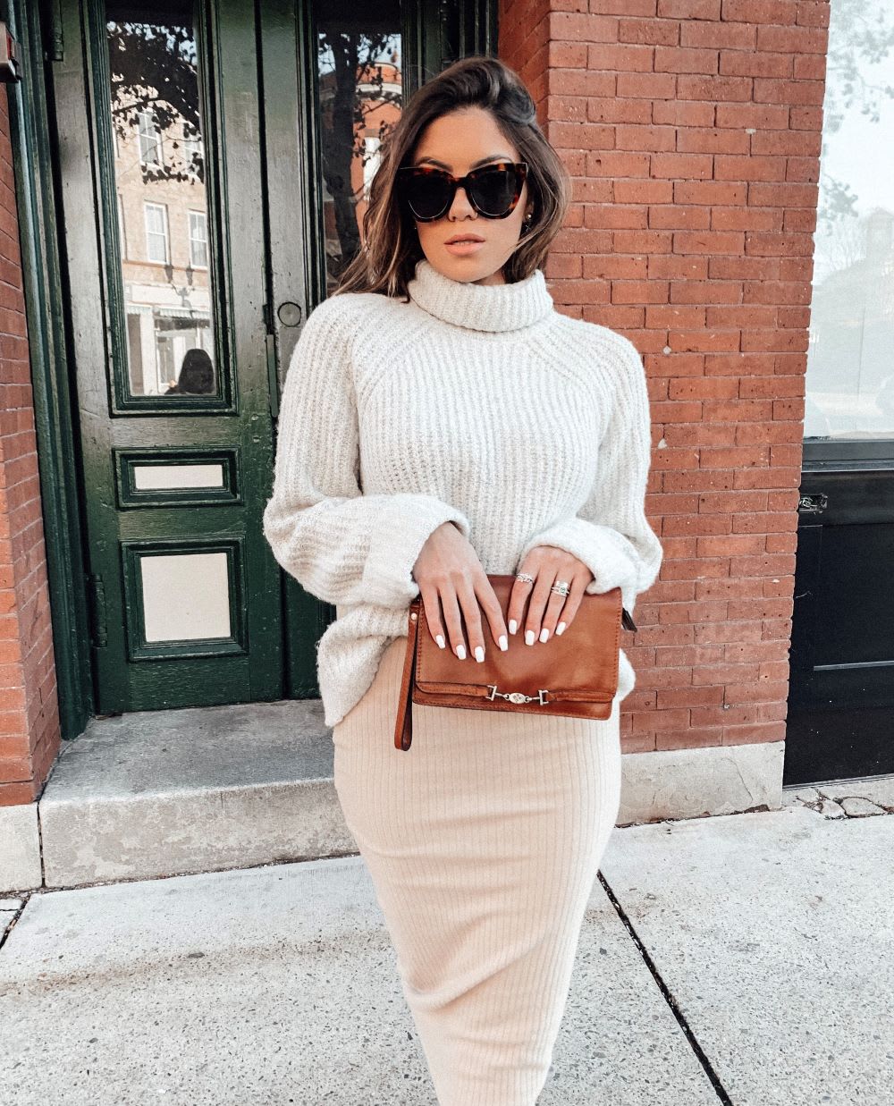 woman in knit sweater and skirt