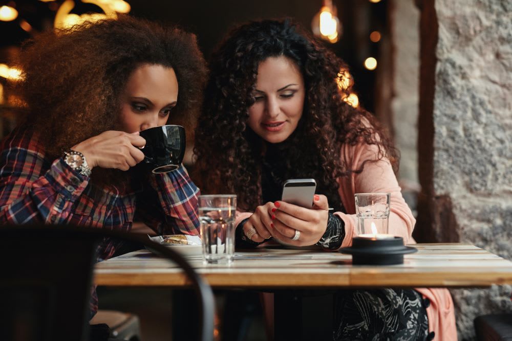 female friends having coffee: divorce tips and advice