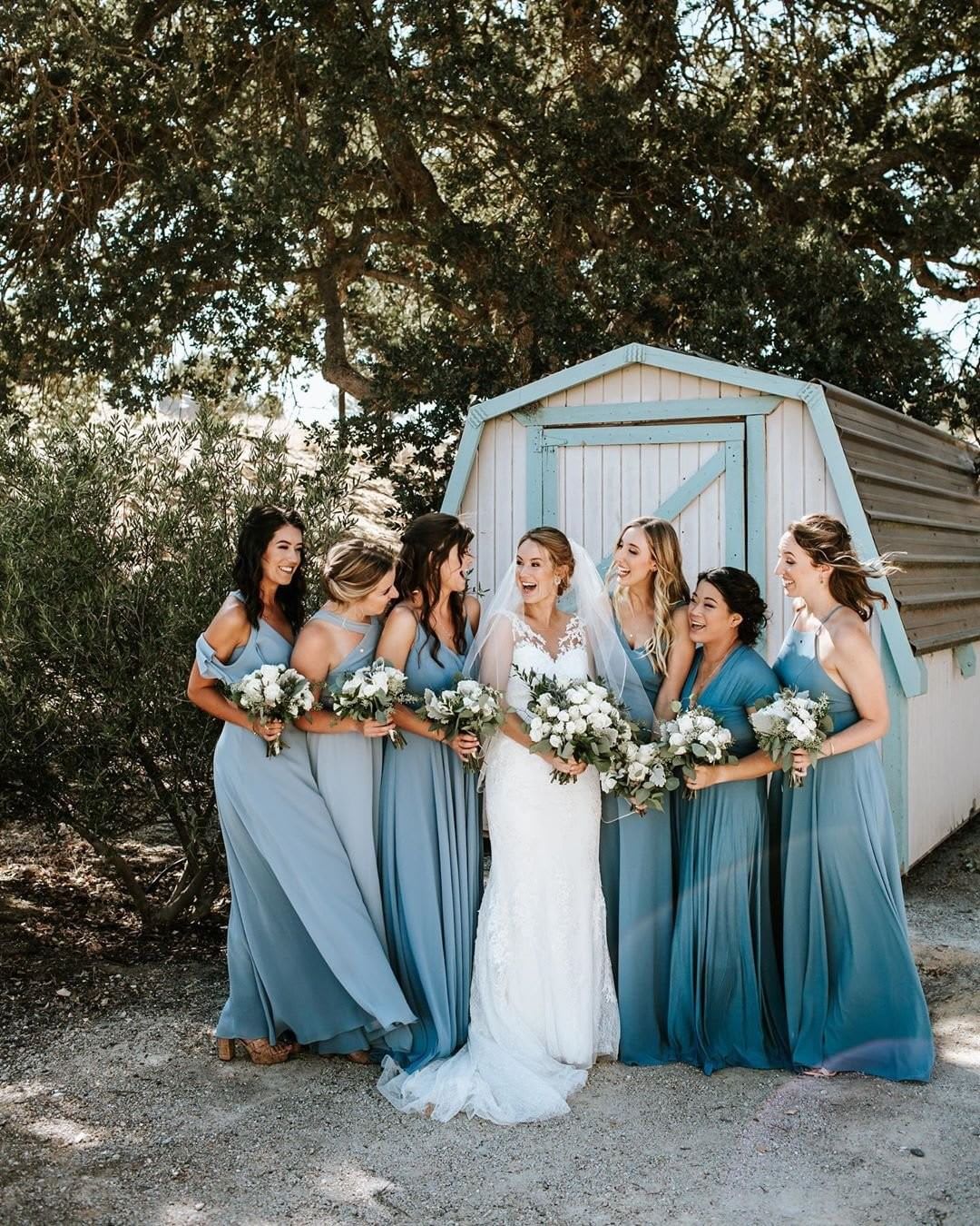bride and bridesmaids in blue