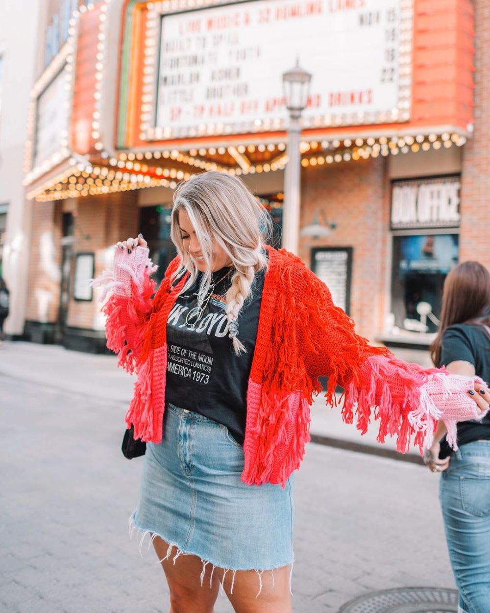 pink and red cardigan with denim skirt
