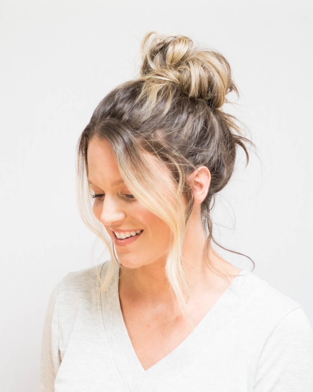 14 Amazing Front Bun Hairdo for The Holidays