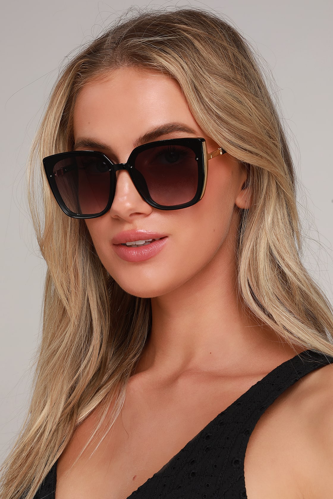 black oversized sunglasses