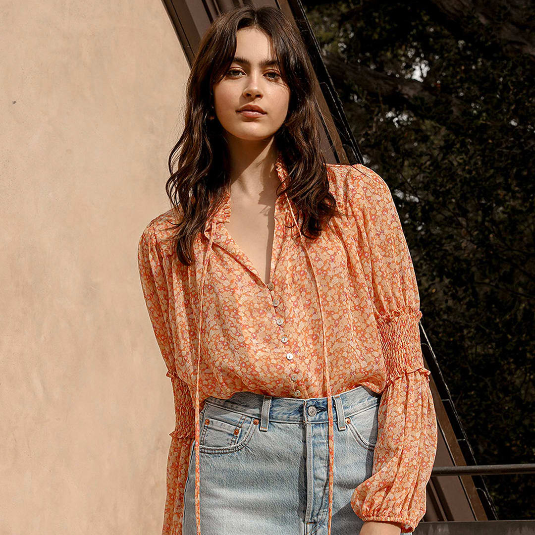 peach floral print ruffled long sleeve bodysuit