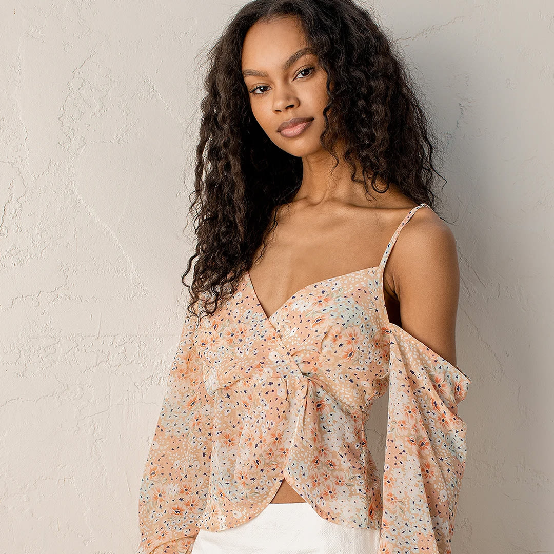 beige floral print asymmetrical long sleeve top