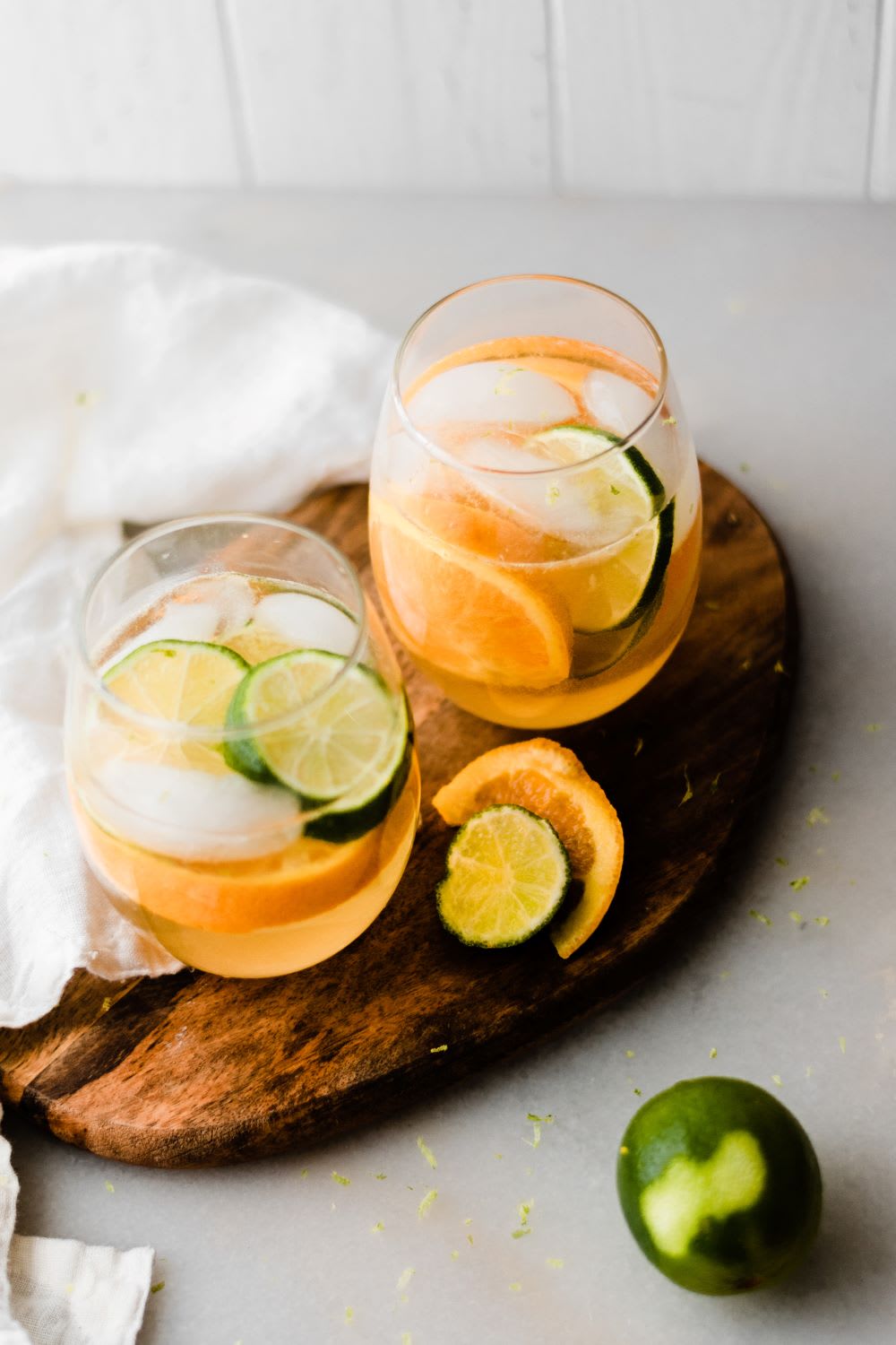 summer sangria in glasses with citrus fruits