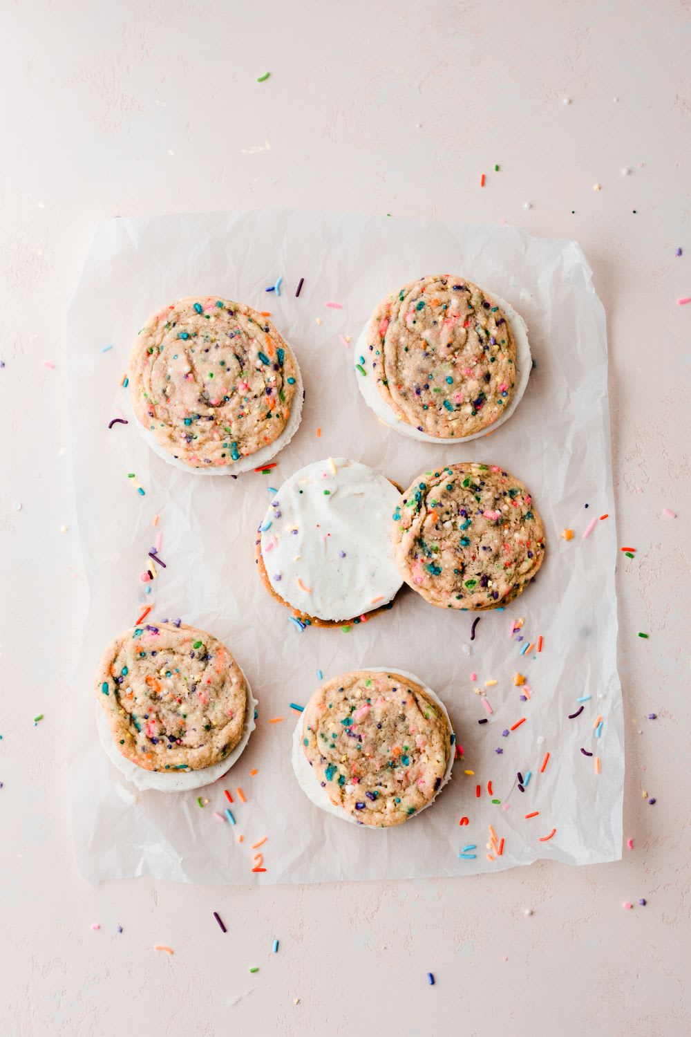 putting together funfetti cookie and ice cream sandwiches
