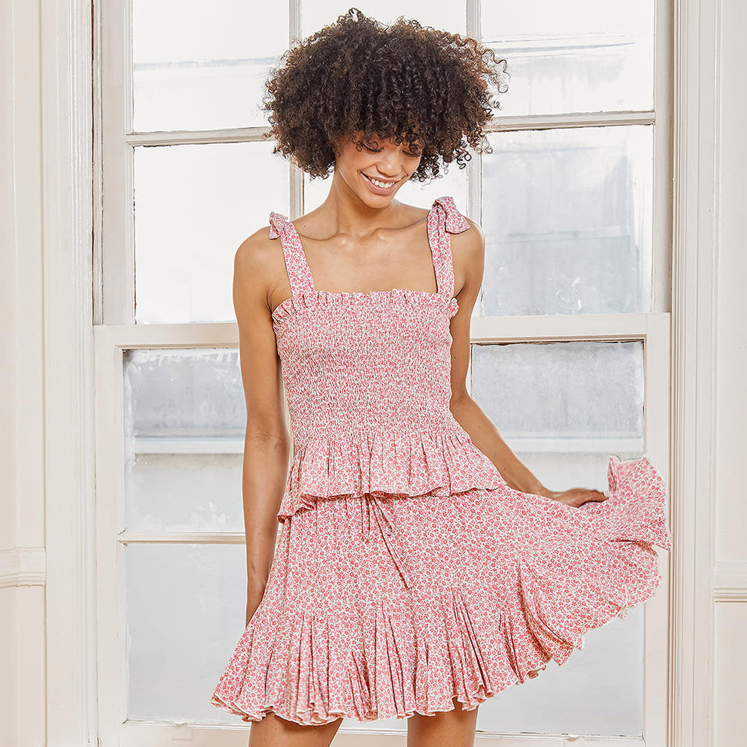 pink floral print smocked tie strap tank top and pleated mini skirt