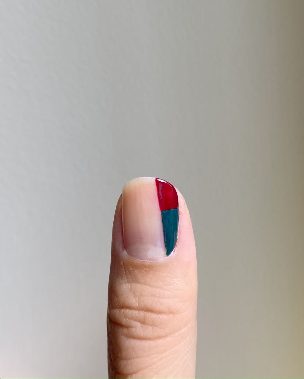 step two of fall jewel tone manicure