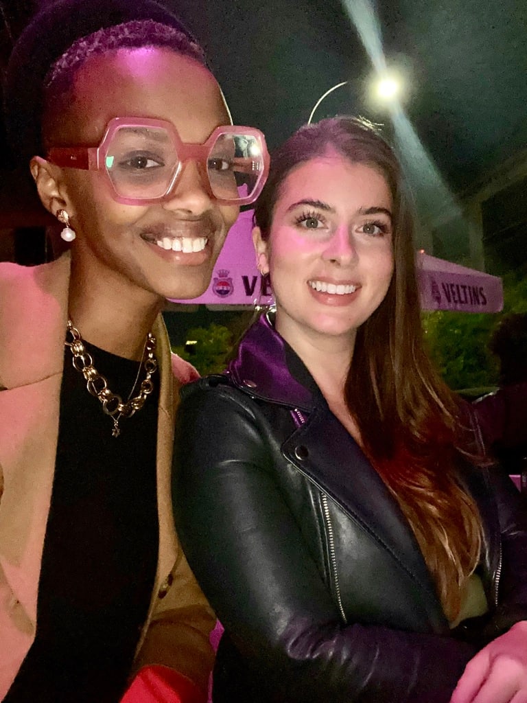 the kinswomen, experts on race conversations, smiling at an outdoor evening event