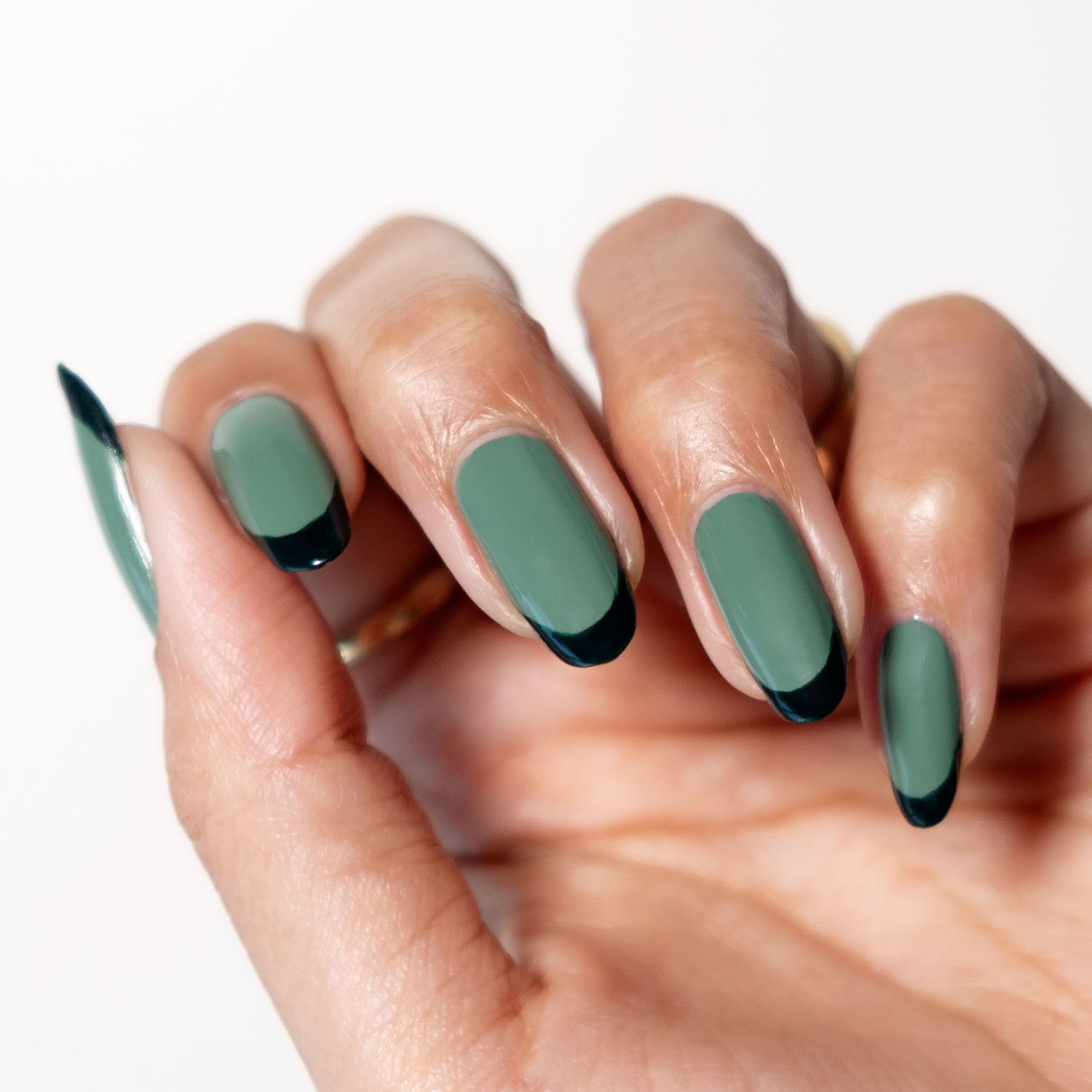 Dark green nails have won our hearts and hands this December. Rich and cozy  - perfect for both glossy and matte finishes. Seen here is… | Instagram
