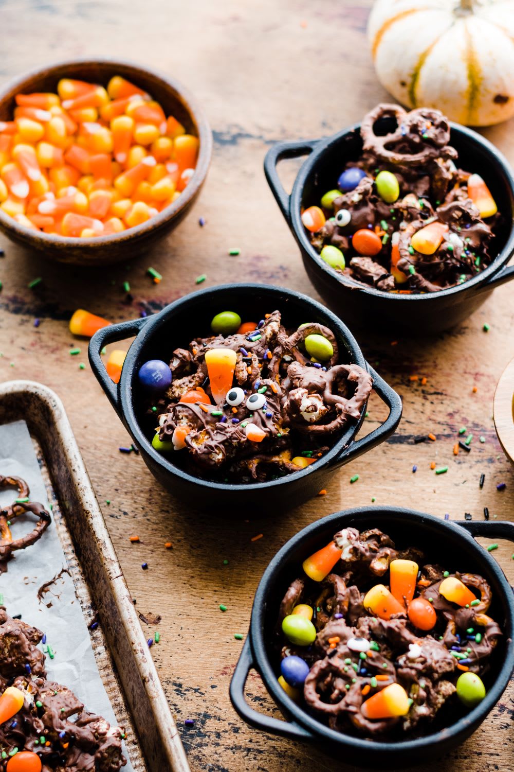bowls of halloween snacks mix with toppings