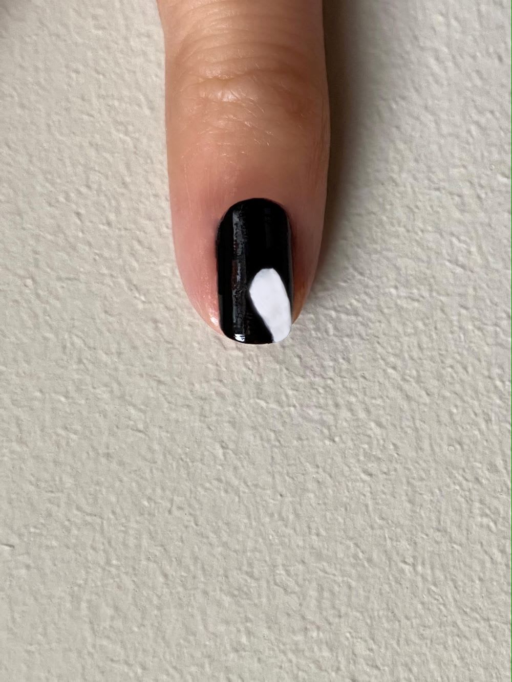 step 1 of white ghost on black nail